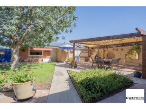 Building Photo - Welcome to your Elegantly Furnished 4/3 Ha...