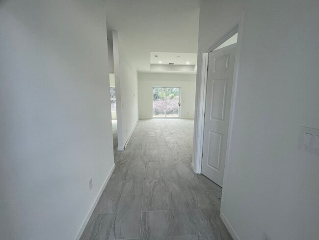Building Photo - MODERN BRAND NEW 4BD/2BA RETREAT IN LEHIGH ACRES!