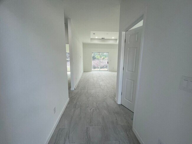 Building Photo - MODERN BRAND NEW RETREAT IN LEHIGH ACRES!