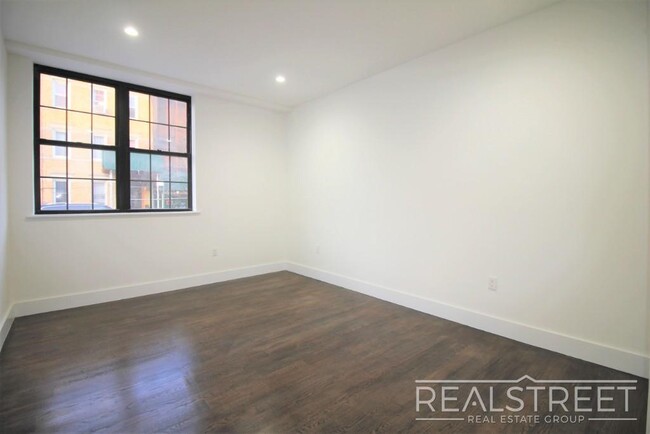 Building Photo - Stunning Giant New 2 BED with GARAGE & W/D...