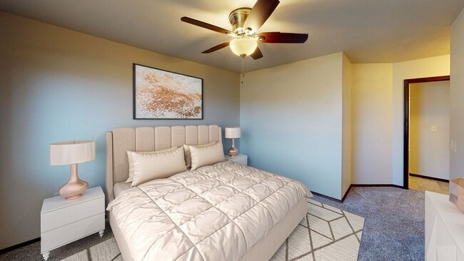 Building Photo - LOWER LEVEL 3 BEDROOM, 2 BATH TOWN HOME, INDIVIDUAL ENTRANCE, DOUBLE ATTACHED GARAGE, PET FRIENDLY