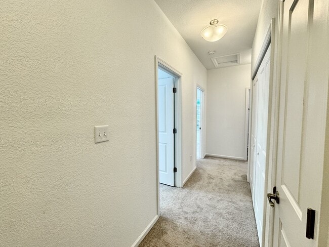 Building Photo - 3 Bedroom Townhome in Spence Crossing! Water/Sewer/Trash/Landscaping INCLUDED! - Attached Garage ...
