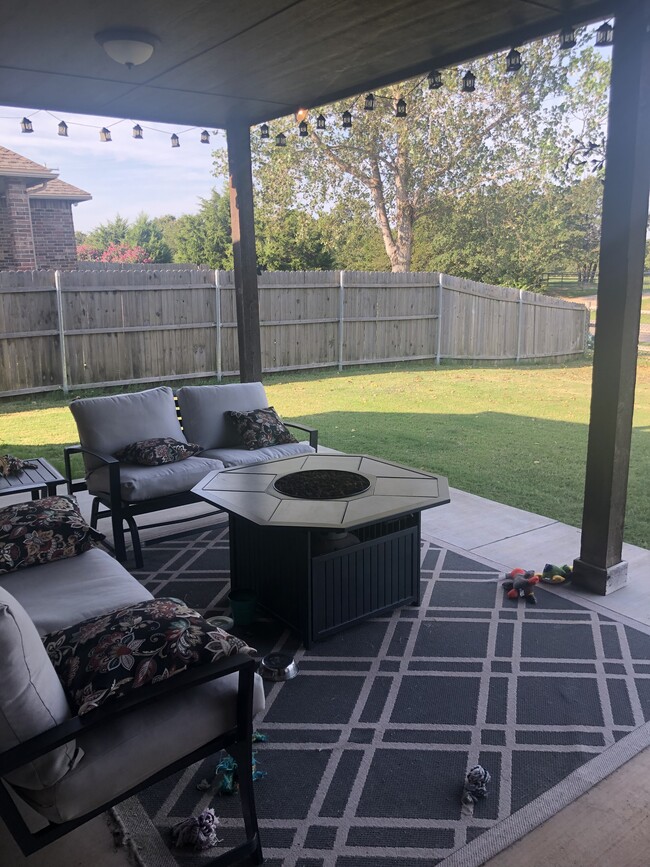 Backyard and patio. Yard fully enclosed for pets. - 2327 Austrian Pine Dr