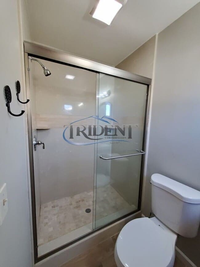 Building Photo - This is a cute 4 bedroom, 2 bath house in an established Woodland community