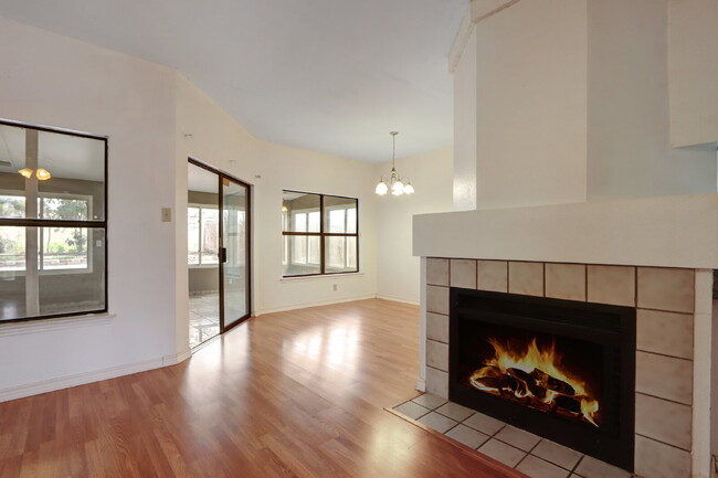 Building Photo - "Cozy 3-Bedroom Retreat with Fireplace Cha...