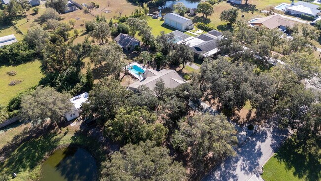 Building Photo - Country-Style Sarasota Living on a Full Acre - Pool Home with Oversized Workshop — Move-In Ready Now