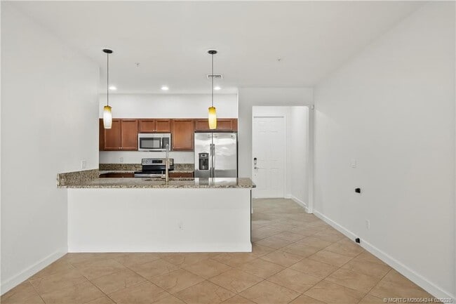 Building Photo - 9512 SW Merlin Ct