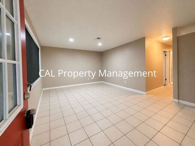 Building Photo - Spacious 4-Bedroom Home with 2-Car Garage & Backyard Oasis