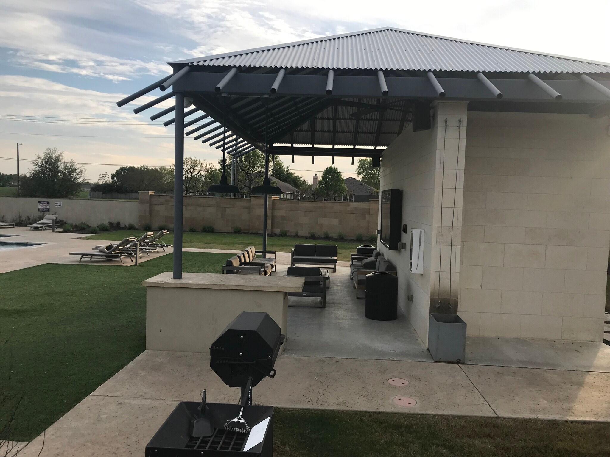 Entertainment area & Barbecue pit, Large outdoor, HD television with lounge chairs - 1313 Eagle Ridge Trl