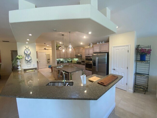 Building Photo - Exquisite - Turnkey, 3 + 2 + Office ANNUAL...