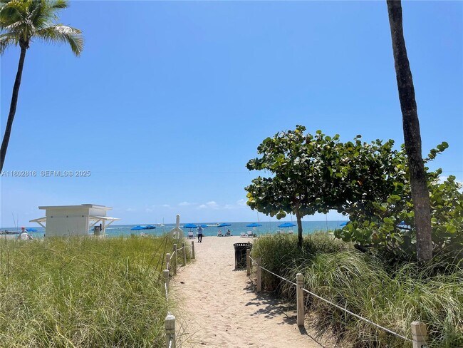 Building Photo - 10275 Collins Ave