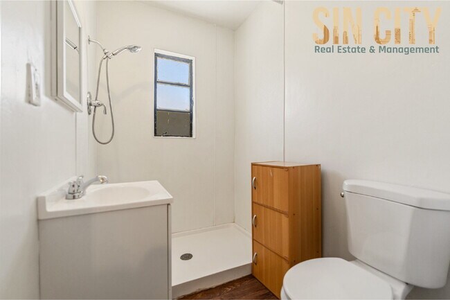 Building Photo - "Charming 1-Bed Duplex with Hardwood Elegance in Downtown Las Vegas!"