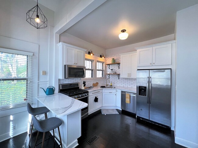 Building Photo - HISTORIC 4TH & GILL BUNGALOW STYLE HOME WITH FRONT PORCH!