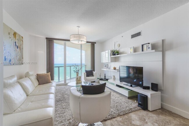 Building Photo - 16699 Collins Ave