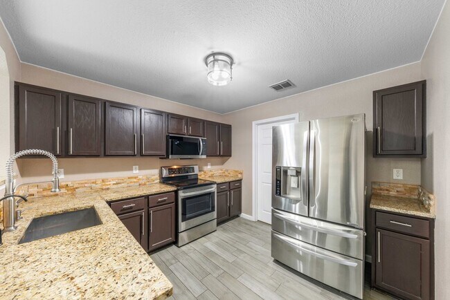 Building Photo - 219 Coriander Bend