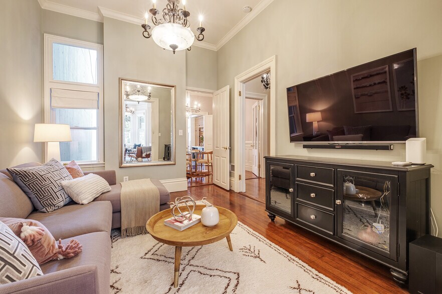 Back Downstairs Double Living room separated by original pocket doors over 12 ft tall - 2188 Sutter St