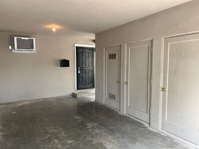 Building Photo - Two-bedroom single story unit with a carport!