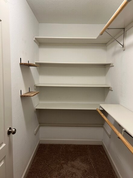 Master bedroom closet (upstairs) - 4701 Rainbow Trout Dr