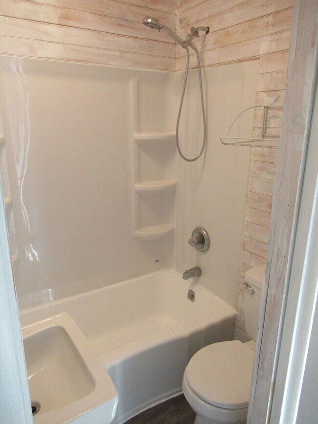 Building Photo - Check out this beautifully renovated white...