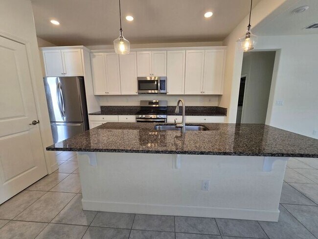 Building Photo - Beautiful Kiley Ranch Home with Open Floor Plan & Private Backyard
