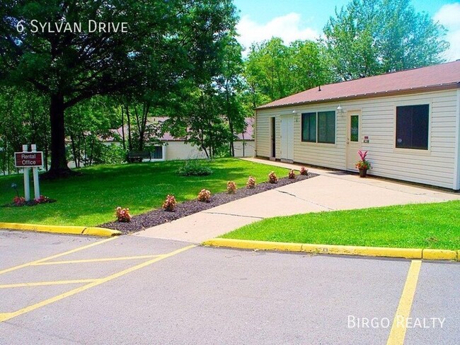 Building Photo - Warm up next to the fire in this 2 bedroom...