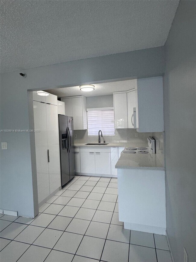 Building Photo - 7965 W 30th Ct
