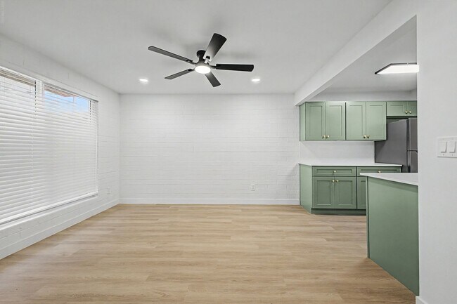 Building Photo - Spacious 2 Bed + Bonus Room | Large Private Yards | Covered Parking | 8 Weeks Free Rent!