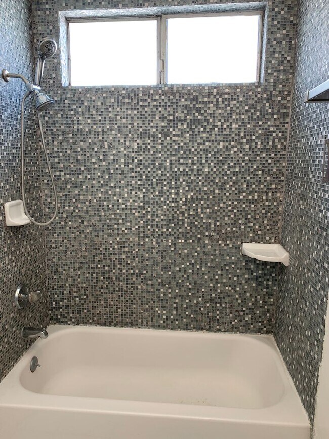Building Photo - Bright, comfortable, and spacious one bedroom Condominium