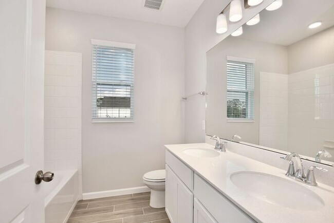 Building Photo - Gorgeous 4/3 Brand New Home with a Spaciou...