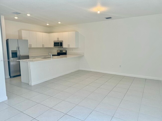 Building Photo - 26459 SW 149th Ave