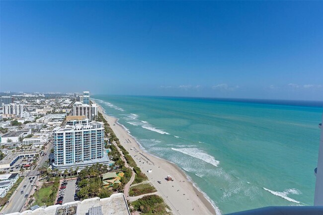 Building Photo - 6365 Collins Ave