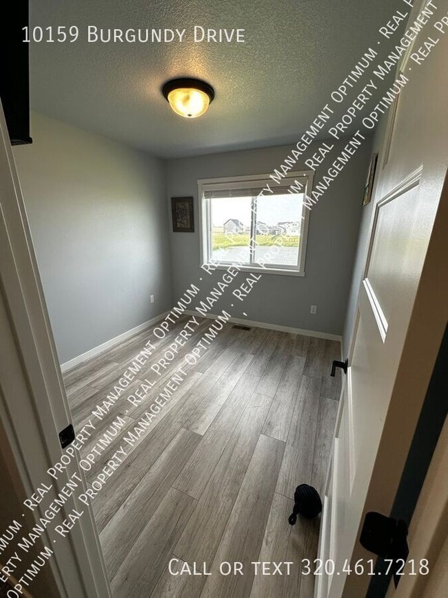 Building Photo - 10159 Burgundy Dr