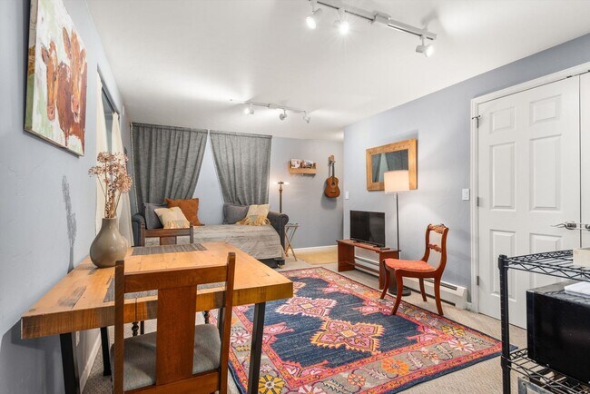 Building Photo - Prime Location | Spacious 4BD Home with El...