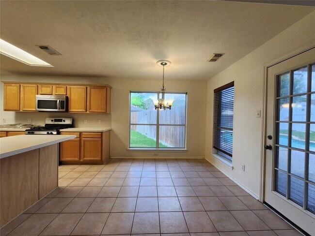 Building Photo - 24422 Travis House Ln