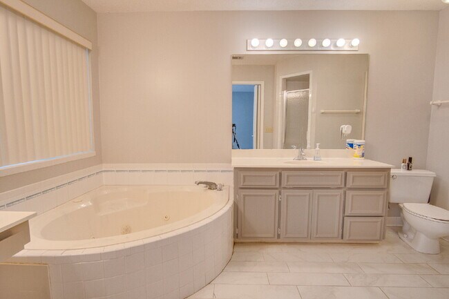 Building Photo - Pool Home with Office, Two Primary Suites ...