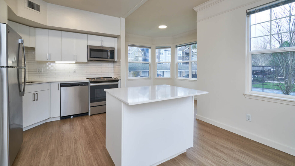 Kitchen with Stainless Steel Appliances - The Reserve at Town Center