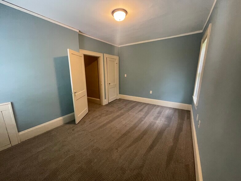 large main bedroom with new carpet - 418 Clement Ave