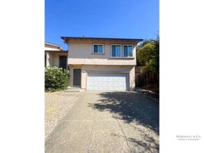 Building Photo - UPDATED AND BEAUTIFUL 2BR/1BA DUPLEX TOWNHOME, NEW WOOD FLOORING, PRIV. ENCLOSED BACK YARD, 2 CAR GA