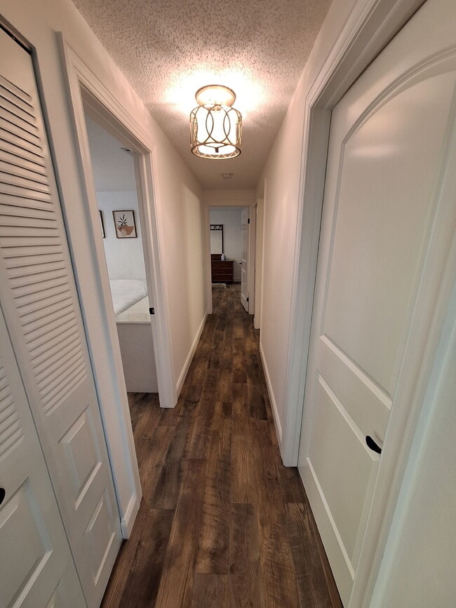 Building Photo - Second Floor Annual rental available now in the 55+ condominium community of Cedar Woods.