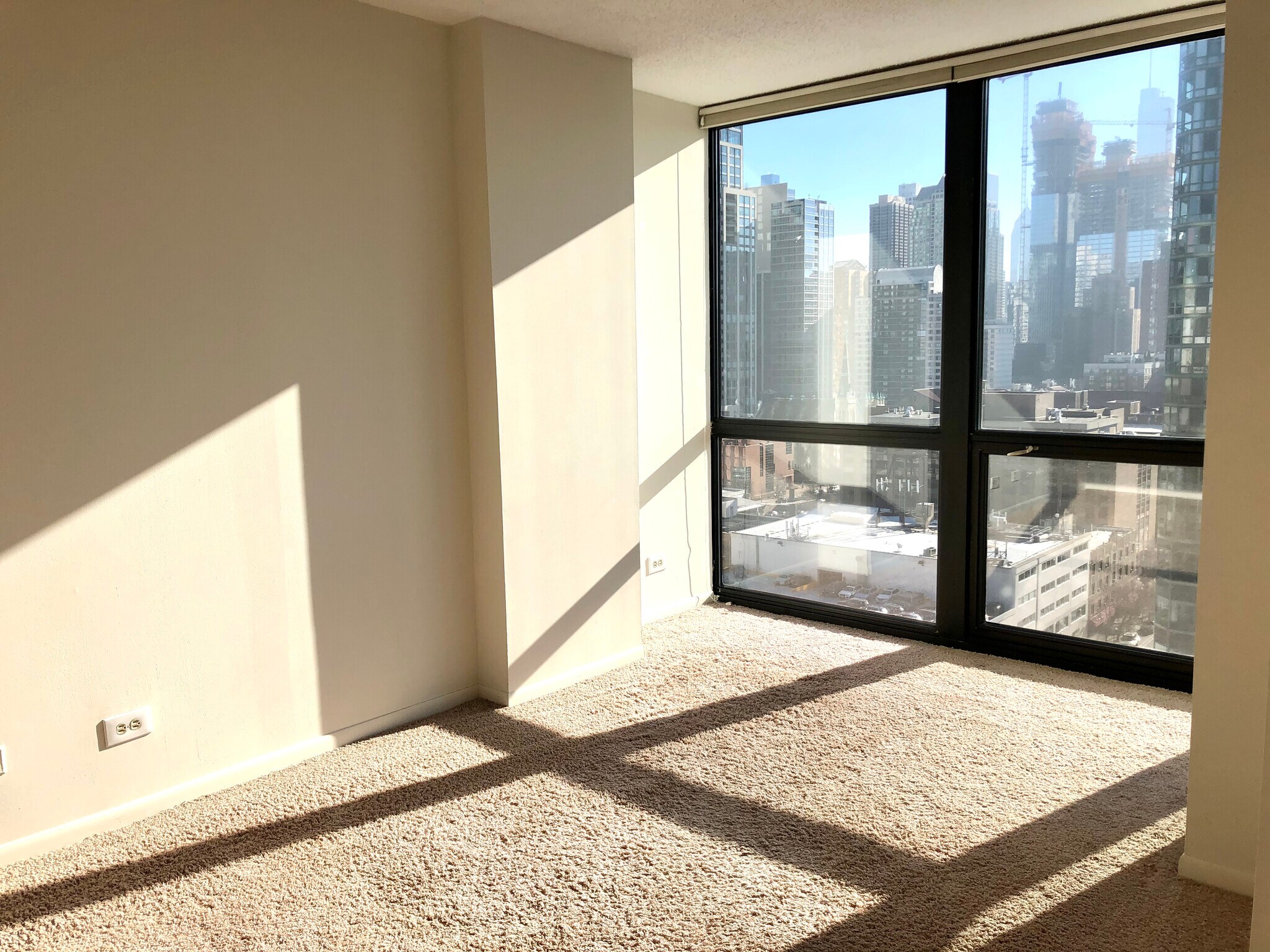Floor to ceiling windows in the bedroom. - 1122 N Clark St