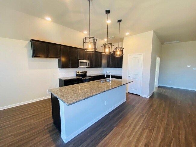 Building Photo - 5205 Leaning Tree