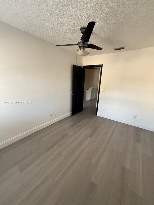 Building Photo - 9986 Royal Palm Blvd