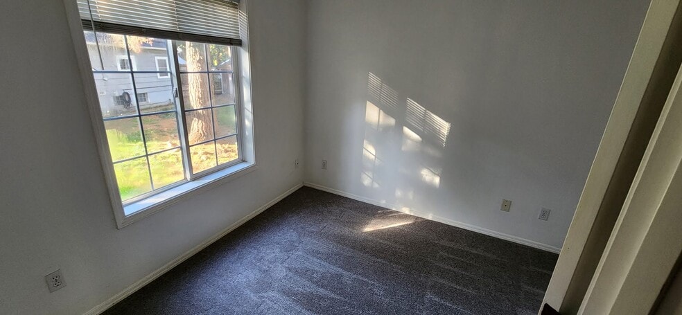 2nd bedroom upstairs facing West with closet. - 12331 SE Whitcomb Dr.