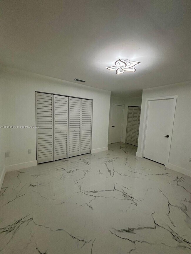 Building Photo - 1301 W 38th Pl