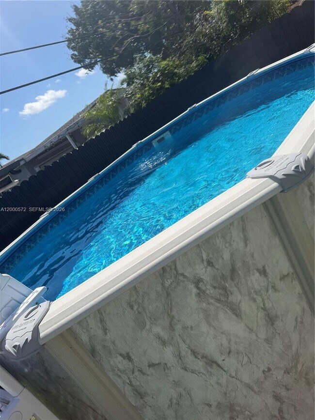 Building Photo - 6497 W 8th Ln