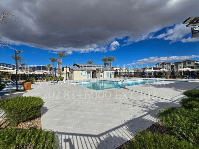 Building Photo - Gated~ 2 Bedroom Townhome w/2 Car Garage~MUST SEE!