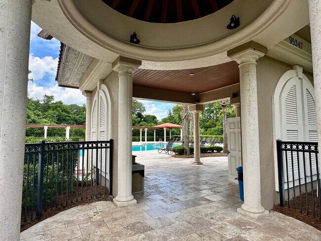 Building Photo - Gated Community! Walking Distance to the B...