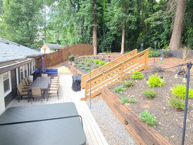 Building Photo - Fully Furnished: Beautiful 4-Bedroom Home ...