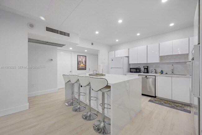 Building Photo - 19370 Collins Ave