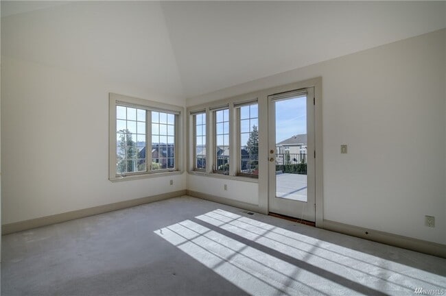 Building Photo - 8479 NE Woodland Cove Dr